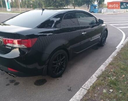 Чорний Кіа Черато, об'ємом двигуна 2 л та пробігом 178 тис. км за 8900 $, фото 8 на Automoto.ua
