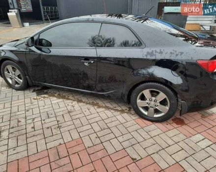 Чорний Кіа Черато, об'ємом двигуна 1.6 л та пробігом 146 тис. км за 7400 $, фото 1 на Automoto.ua