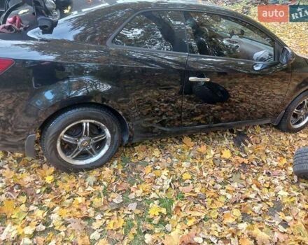 Чорний Кіа Черато, об'ємом двигуна 2 л та пробігом 178 тис. км за 8900 $, фото 10 на Automoto.ua
