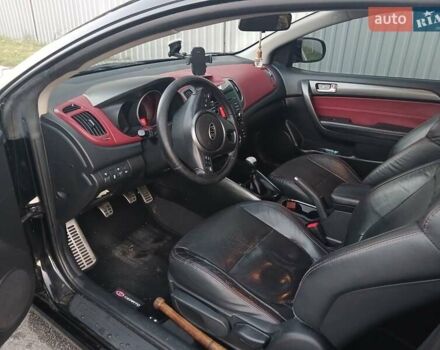 Чорний Кіа Черато, об'ємом двигуна 2 л та пробігом 178 тис. км за 8900 $, фото 3 на Automoto.ua
