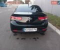 Чорний Кіа Черато, об'ємом двигуна 2 л та пробігом 178 тис. км за 8900 $, фото 9 на Automoto.ua