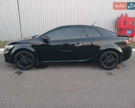 Чорний Кіа Черато, об'ємом двигуна 2 л та пробігом 178 тис. км за 8900 $, фото 2 на Automoto.ua