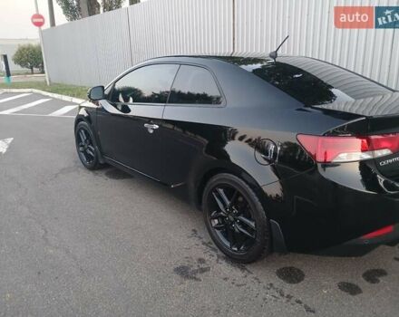 Чорний Кіа Черато, об'ємом двигуна 2 л та пробігом 178 тис. км за 8900 $, фото 4 на Automoto.ua