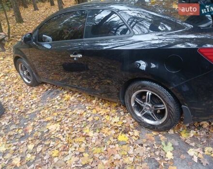 Чорний Кіа Черато, об'ємом двигуна 2 л та пробігом 178 тис. км за 8900 $, фото 11 на Automoto.ua