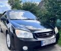 Черный Киа Черато, объемом двигателя 1.6 л и пробегом 158 тыс. км за 4500 $, фото 1 на Automoto.ua