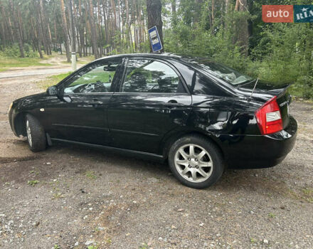 Чорний Кіа Черато, об'ємом двигуна 1.99 л та пробігом 207 тис. км за 4900 $, фото 2 на Automoto.ua