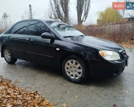 Черный Киа Черато, объемом двигателя 1.6 л и пробегом 280 тыс. км за 2999 $, фото 4 на Automoto.ua