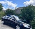 Черный Киа Черато, объемом двигателя 1.6 л и пробегом 158 тыс. км за 4500 $, фото 6 на Automoto.ua