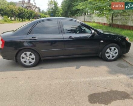 Черный Киа Черато, объемом двигателя 1.6 л и пробегом 168 тыс. км за 7000 $, фото 2 на Automoto.ua