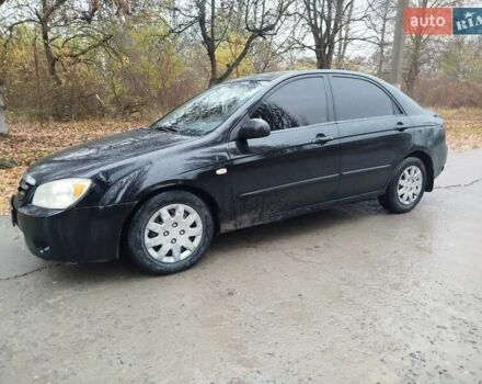 Черный Киа Черато, объемом двигателя 1.6 л и пробегом 280 тыс. км за 2999 $, фото 1 на Automoto.ua