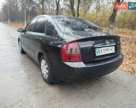 Черный Киа Черато, объемом двигателя 1.6 л и пробегом 280 тыс. км за 2999 $, фото 7 на Automoto.ua