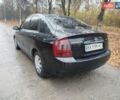 Черный Киа Черато, объемом двигателя 1.6 л и пробегом 280 тыс. км за 2999 $, фото 7 на Automoto.ua