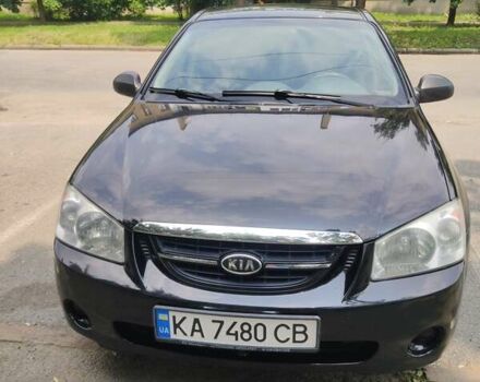 Черный Киа Черато, объемом двигателя 1.6 л и пробегом 168 тыс. км за 7000 $, фото 1 на Automoto.ua