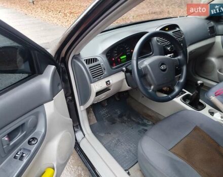 Черный Киа Черато, объемом двигателя 1.6 л и пробегом 280 тыс. км за 2999 $, фото 8 на Automoto.ua