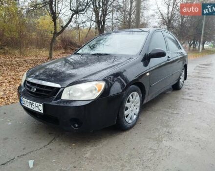Черный Киа Черато, объемом двигателя 1.6 л и пробегом 280 тыс. км за 2999 $, фото 2 на Automoto.ua