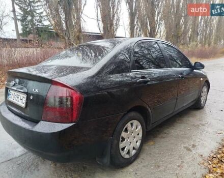 Черный Киа Черато, объемом двигателя 1.6 л и пробегом 280 тыс. км за 2999 $, фото 5 на Automoto.ua