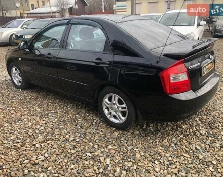 Чорний Кіа Черато, об'ємом двигуна 2 л та пробігом 177 тис. км за 4399 $, фото 5 на Automoto.ua