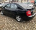 Чорний Кіа Черато, об'ємом двигуна 2 л та пробігом 177 тис. км за 4399 $, фото 5 на Automoto.ua