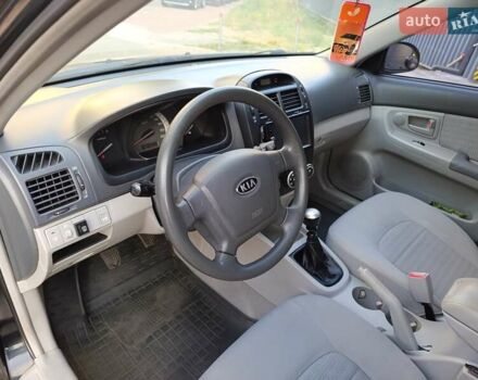 Чорний Кіа Черато, об'ємом двигуна 1.6 л та пробігом 237 тис. км за 5300 $, фото 23 на Automoto.ua