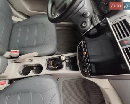 Черный Киа Черато, объемом двигателя 1.59 л и пробегом 203 тыс. км за 4400 $, фото 1 на Automoto.ua