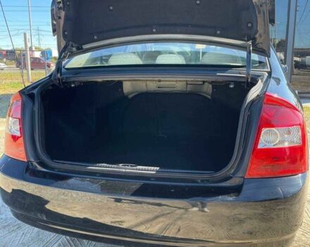 Черный Киа Черато, объемом двигателя 2 л и пробегом 268 тыс. км за 4200 $, фото 7 на Automoto.ua