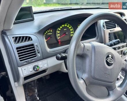 Черный Киа Черато, объемом двигателя 2 л и пробегом 318 тыс. км за 3900 $, фото 11 на Automoto.ua