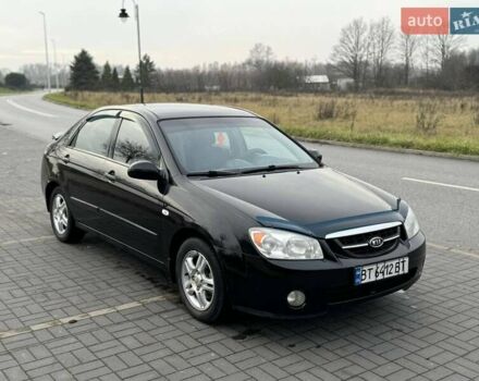 Чорний Кіа Черато, об'ємом двигуна 1.98 л та пробігом 177 тис. км за 3950 $, фото 4 на Automoto.ua