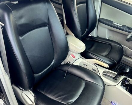 Черный Киа Черато, объемом двигателя 2 л и пробегом 232 тыс. км за 4100 $, фото 11 на Automoto.ua