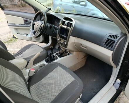 Чорний Кіа Черато, об'ємом двигуна 2 л та пробігом 230 тис. км за 4000 $, фото 4 на Automoto.ua