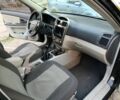 Чорний Кіа Черато, об'ємом двигуна 2 л та пробігом 230 тис. км за 4000 $, фото 4 на Automoto.ua