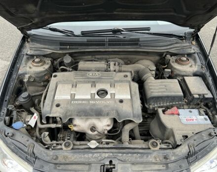 Черный Киа Черато, объемом двигателя 1.6 л и пробегом 230 тыс. км за 3200 $, фото 17 на Automoto.ua