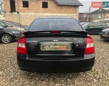 Чорний Кіа Черато, об'ємом двигуна 2 л та пробігом 177 тис. км за 4399 $, фото 6 на Automoto.ua