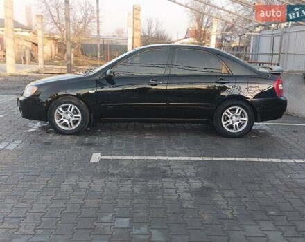 Черный Киа Черато, объемом двигателя 1.6 л и пробегом 230 тыс. км за 4250 $, фото 12 на Automoto.ua