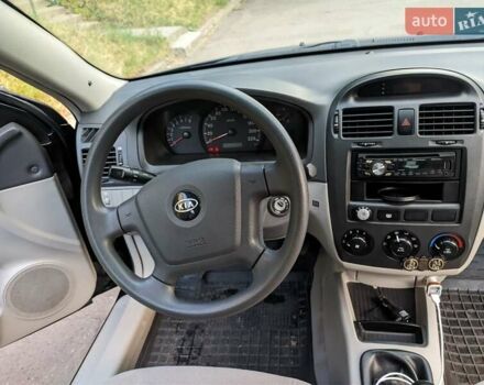 Чорний Кіа Черато, об'ємом двигуна 1.5 л та пробігом 221 тис. км за 4200 $, фото 20 на Automoto.ua