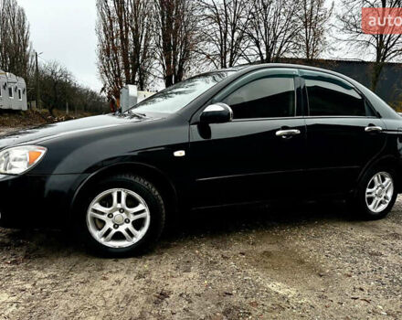 Чорний Кіа Черато, об'ємом двигуна 1.98 л та пробігом 240 тис. км за 5100 $, фото 1 на Automoto.ua