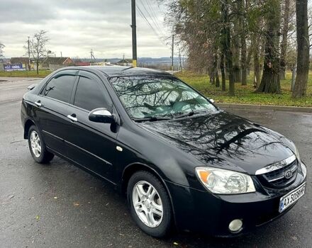 Черный Киа Черато, объемом двигателя 2 л и пробегом 232 тыс. км за 4100 $, фото 2 на Automoto.ua