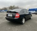 Черный Киа Черато, объемом двигателя 1.6 л и пробегом 230 тыс. км за 3200 $, фото 5 на Automoto.ua