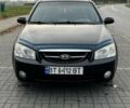Чорний Кіа Черато, об'ємом двигуна 1.98 л та пробігом 177 тис. км за 3950 $, фото 9 на Automoto.ua