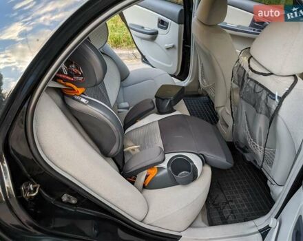 Чорний Кіа Черато, об'ємом двигуна 1.5 л та пробігом 221 тис. км за 4200 $, фото 13 на Automoto.ua