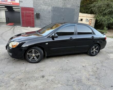 Черный Киа Черато, объемом двигателя 1.6 л и пробегом 286 тыс. км за 3500 $, фото 2 на Automoto.ua