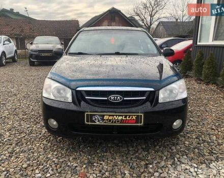 Чорний Кіа Черато, об'ємом двигуна 2 л та пробігом 177 тис. км за 4399 $, фото 1 на Automoto.ua