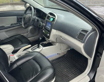 Черный Киа Черато, объемом двигателя 1.98 л и пробегом 236 тыс. км за 4100 $, фото 12 на Automoto.ua