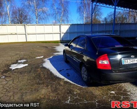Чорний Кіа Черато, об'ємом двигуна 1.6 л та пробігом 0 тис. км за 4100 $, фото 7 на Automoto.ua