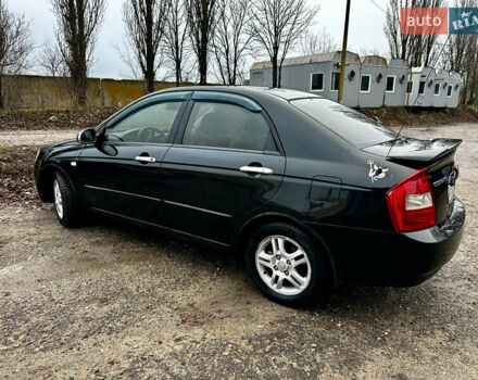 Чорний Кіа Черато, об'ємом двигуна 1.98 л та пробігом 240 тис. км за 5100 $, фото 5 на Automoto.ua