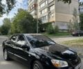 Черный Киа Черато, объемом двигателя 1.6 л и пробегом 181 тыс. км за 3900 $, фото 4 на Automoto.ua