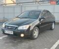 Черный Киа Черато, объемом двигателя 1.6 л и пробегом 230 тыс. км за 4250 $, фото 3 на Automoto.ua