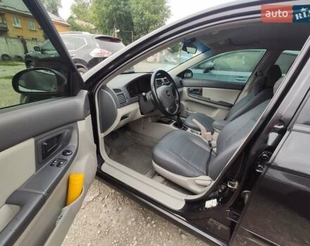 Черный Киа Черато, объемом двигателя 1.59 л и пробегом 203 тыс. км за 4400 $, фото 2 на Automoto.ua