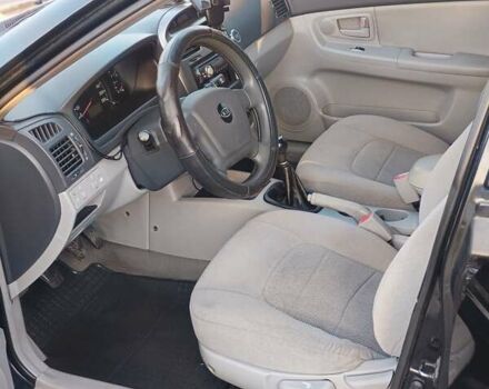 Черный Киа Черато, объемом двигателя 1.6 л и пробегом 230 тыс. км за 4250 $, фото 8 на Automoto.ua