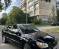 Черный Киа Черато, объемом двигателя 1.6 л и пробегом 181 тыс. км за 3900 $, фото 4 на Automoto.ua