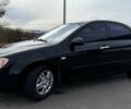 Чорний Кіа Черато, об'ємом двигуна 2 л та пробігом 342 тис. км за 4500 $, фото 1 на Automoto.ua